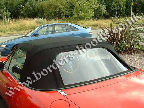 Black mohair hood installation