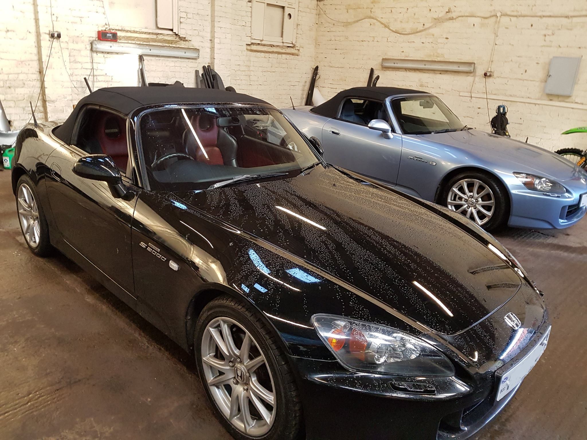 Two Honda S2000s in the workshop