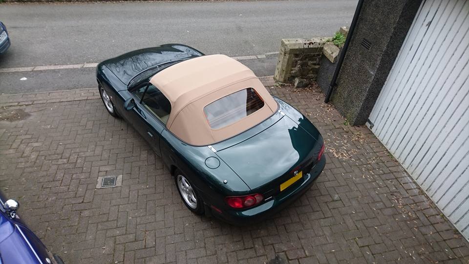 Green Mazda MX5 MK2 with beige mohair hood