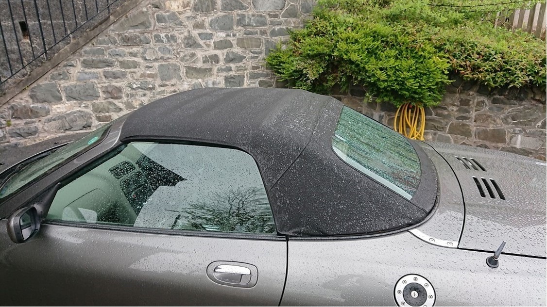 MG roadster with new black hood